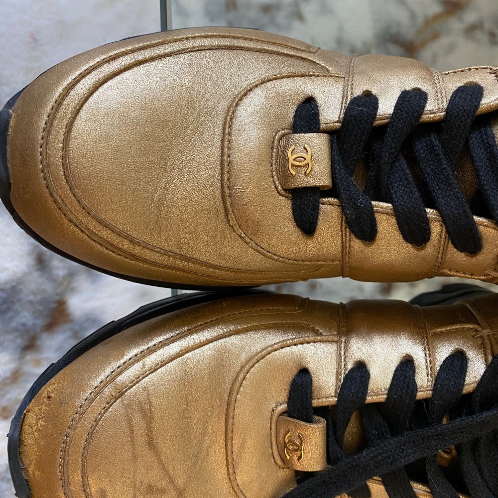 Chanel gold men’s sneakers